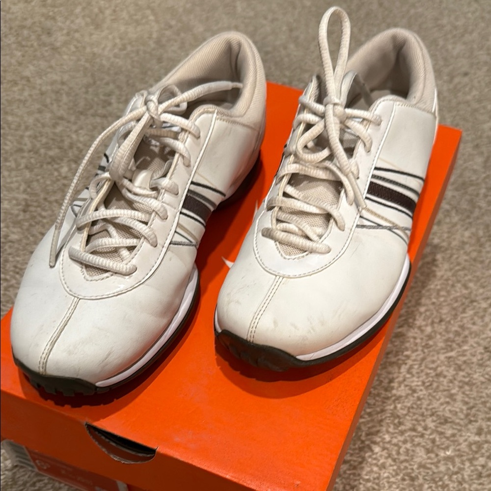 White Sneakers with Black Stripes